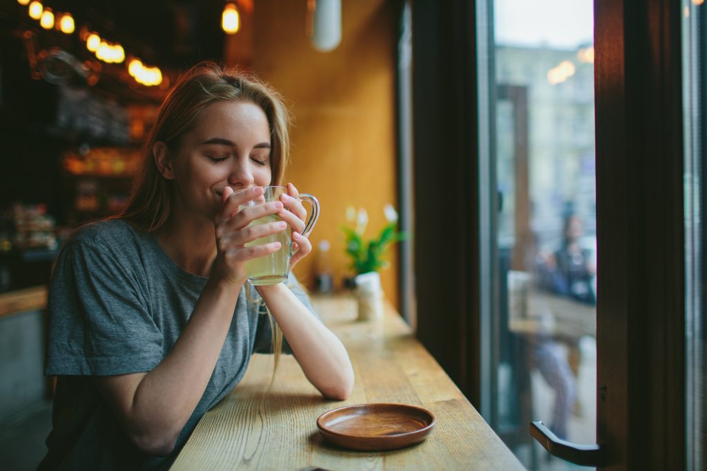 Woman drinking hot tea