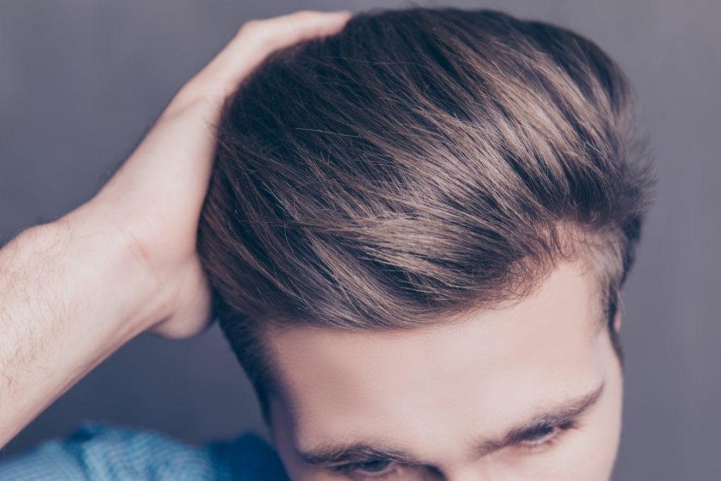 Young man with healthy hair 