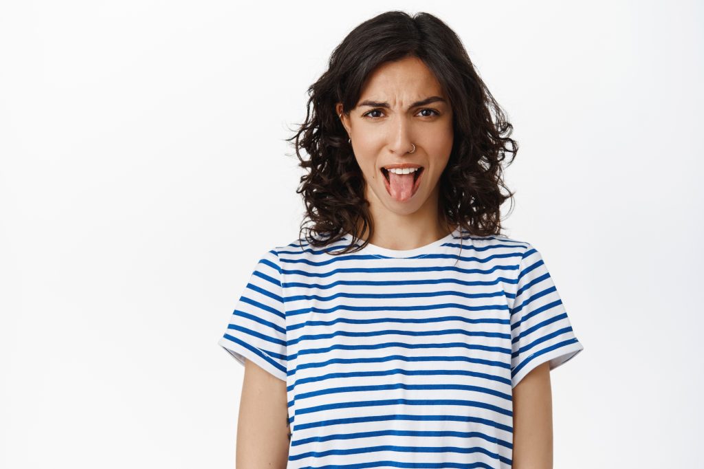 Women sticking out her tongue