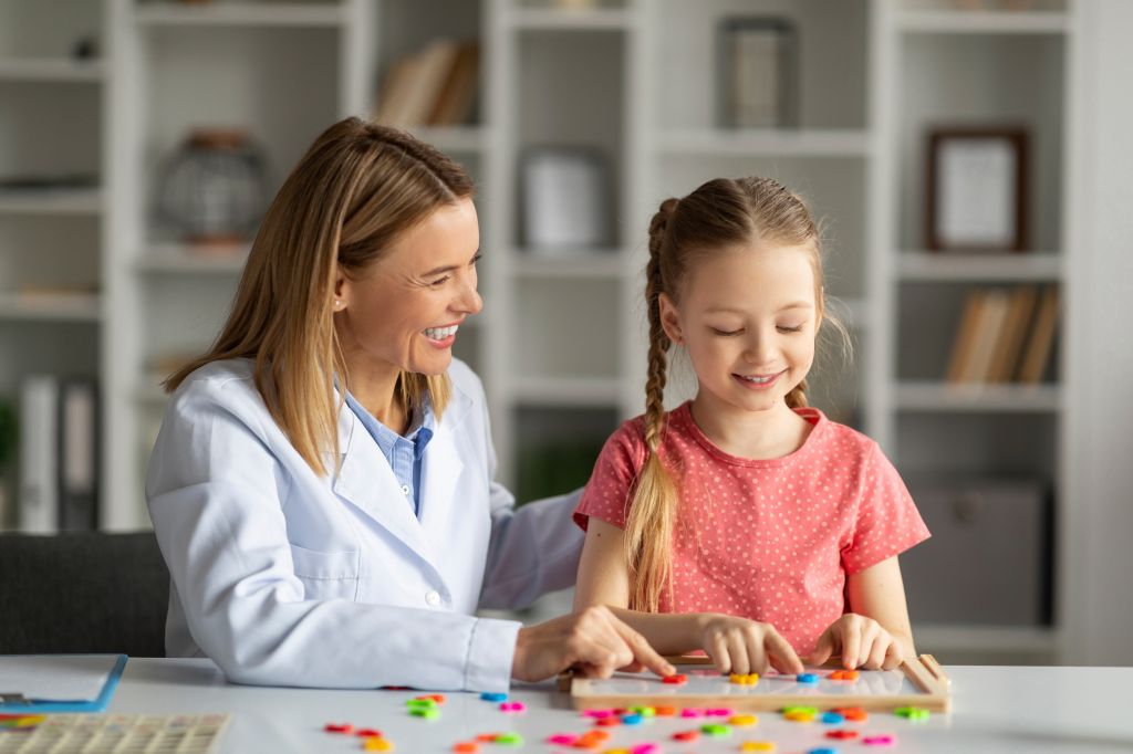Female doctor and young girl 