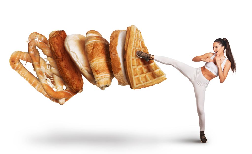 Woman kicking unhealthy foods 