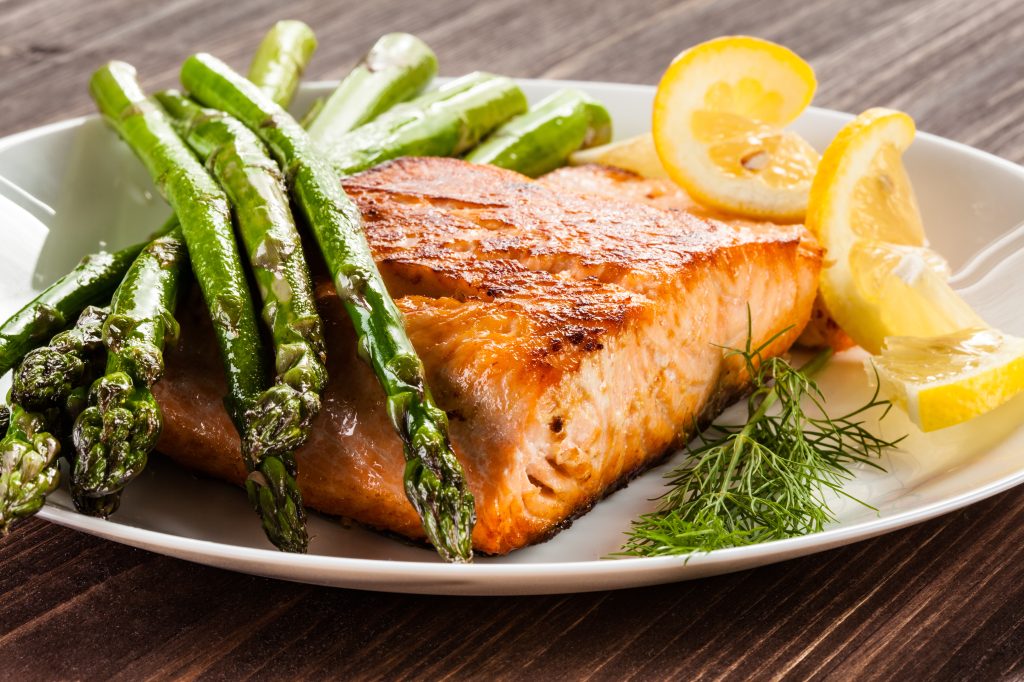 Grilled fish dinner with lemon