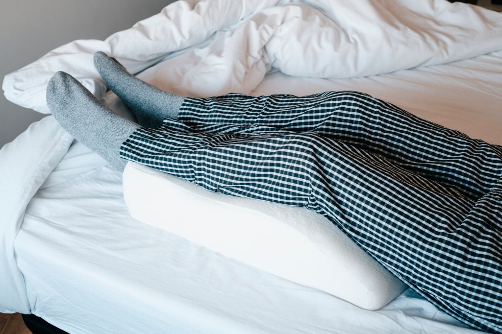 Man elevating legs