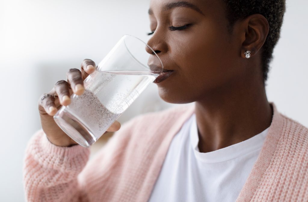 A woman drinking water