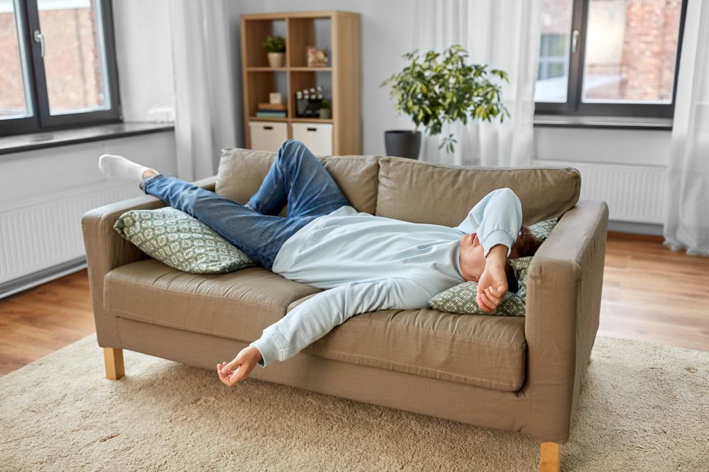 Low energy man on couch