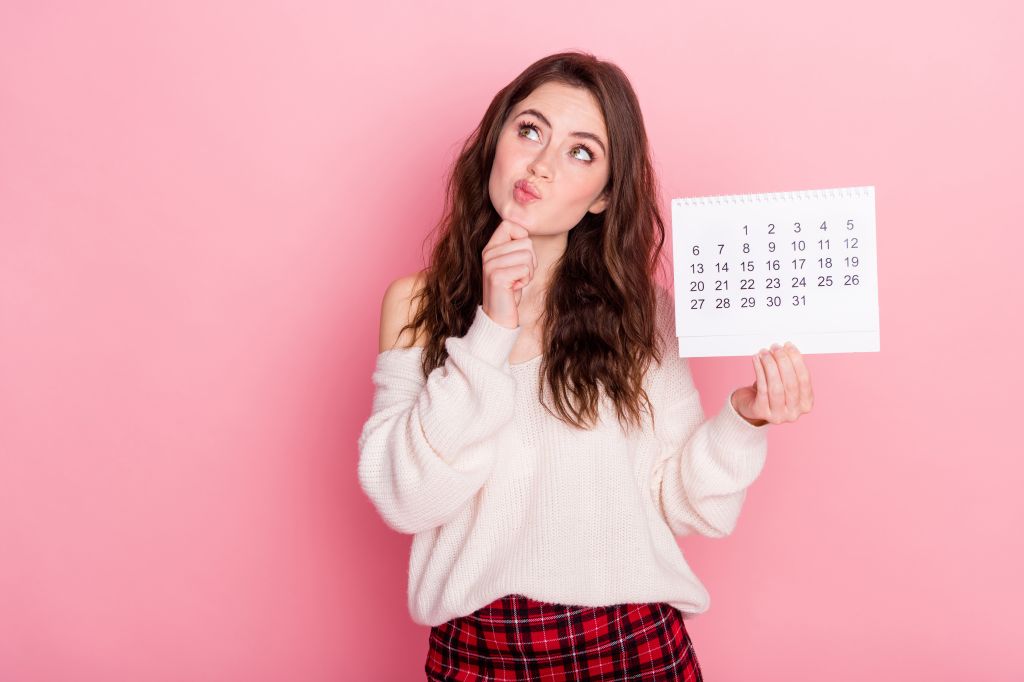 Woman holding a calendar  