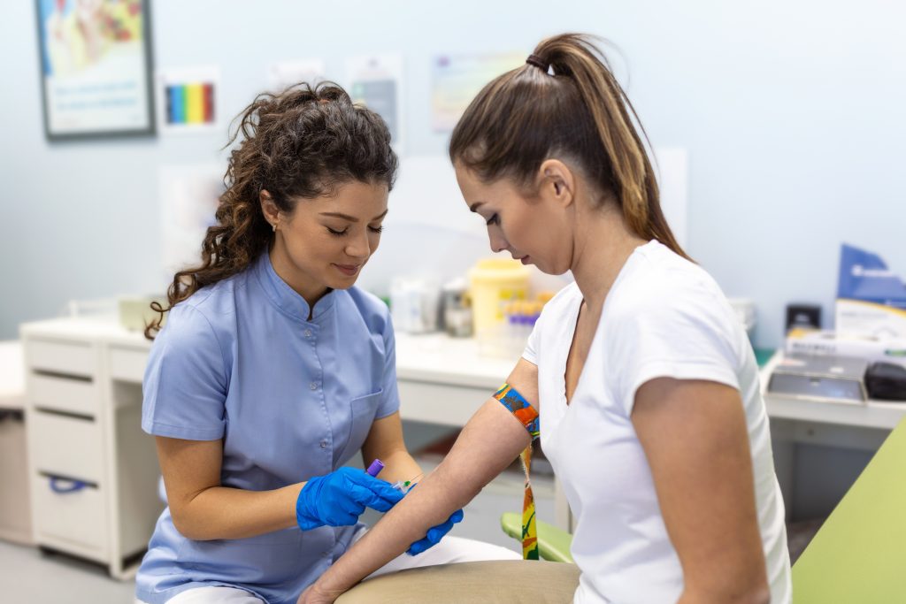 Doctor taking a blood sample