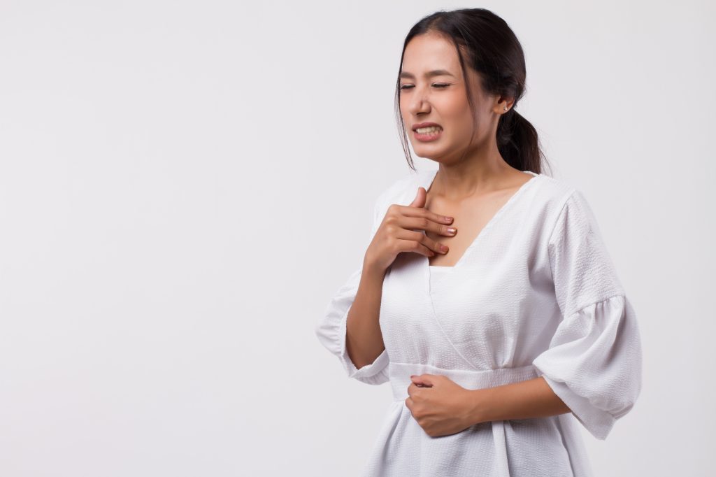 Woman with acid reflux  