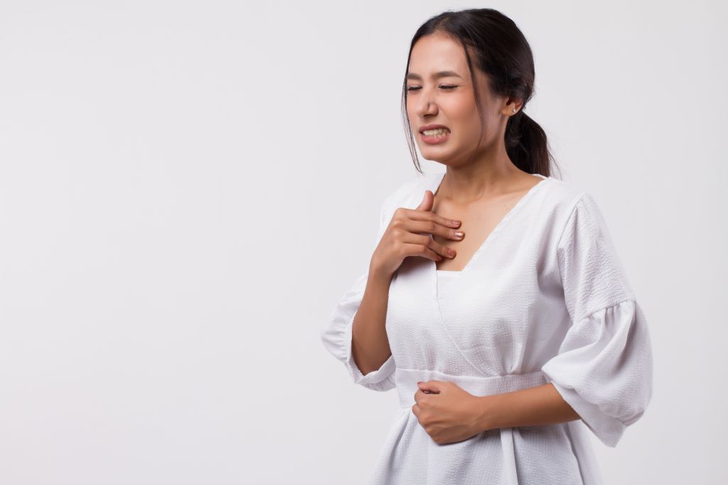 Woman with acid reflux