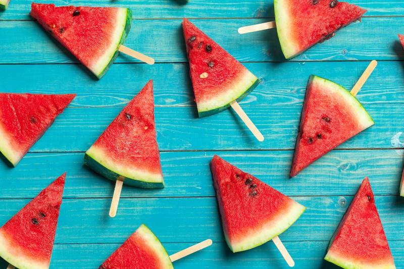 Sliced watermelon on sticks