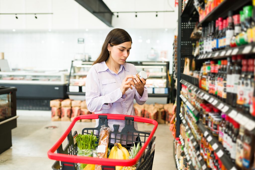 Women checking a nutrition label