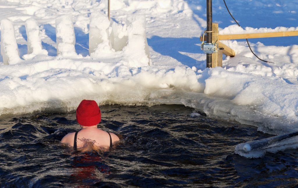 Woman in ice water