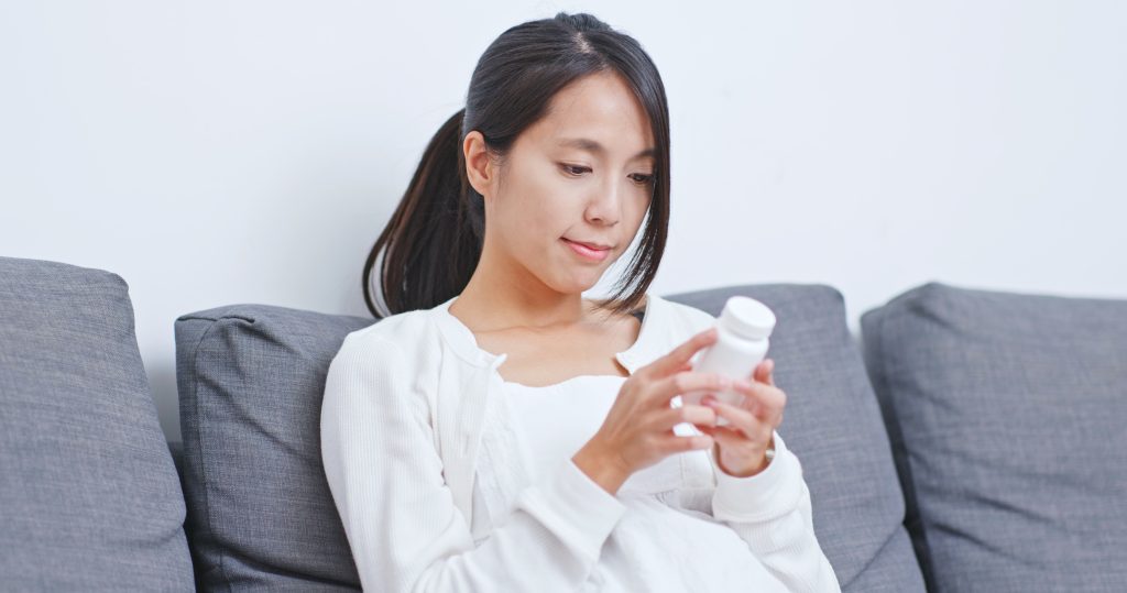 Woman reading a label     