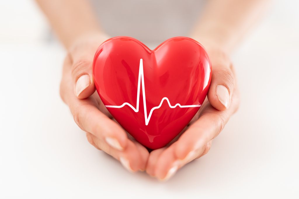 Woman holding red heart