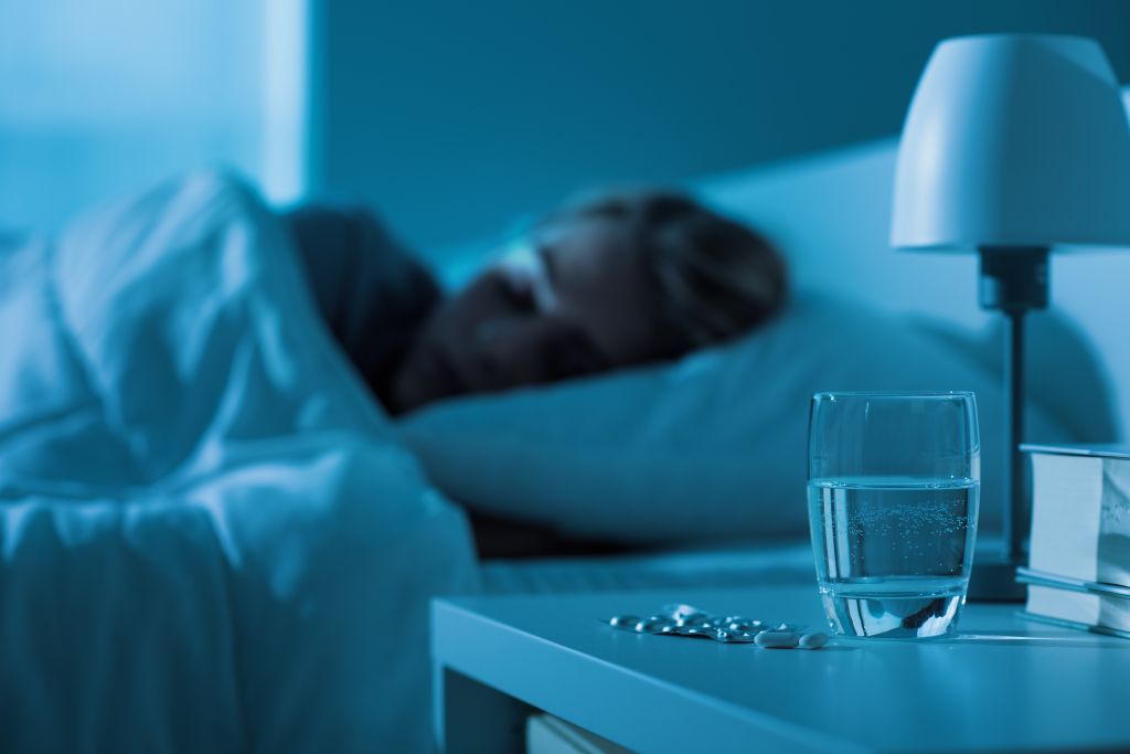 Woman sleeping in bed 
