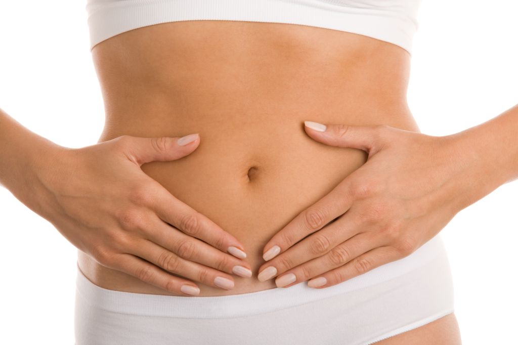 Woman with hands on her stomach