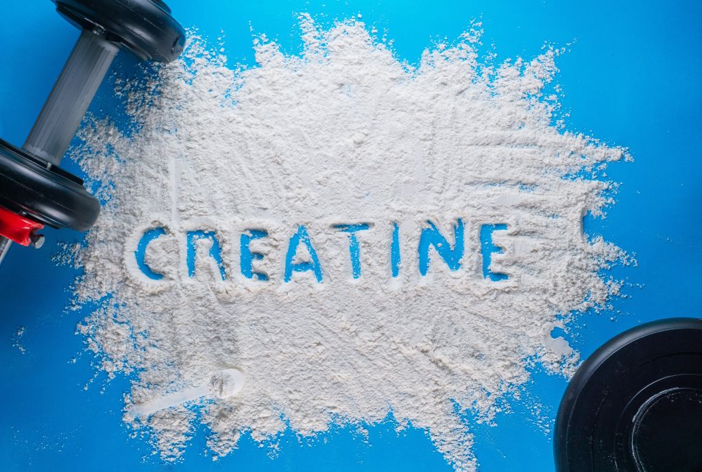 Creatine written on white powder 