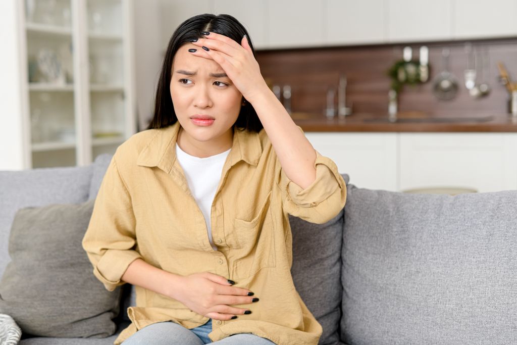 Young woman feeling ill