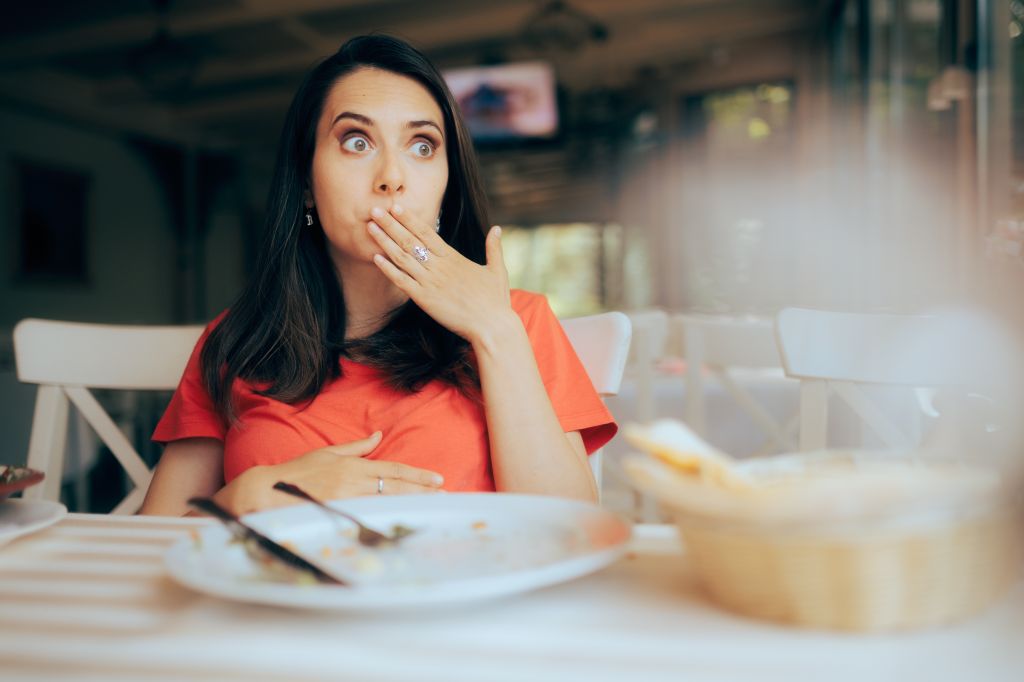 Woman feeling too full 