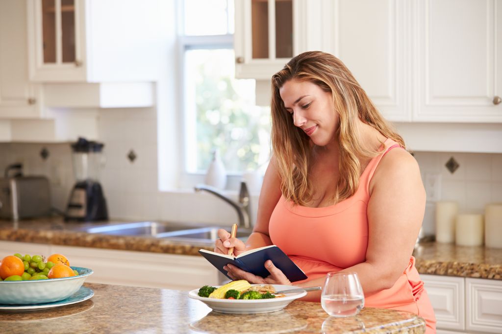 Woman taking notes 