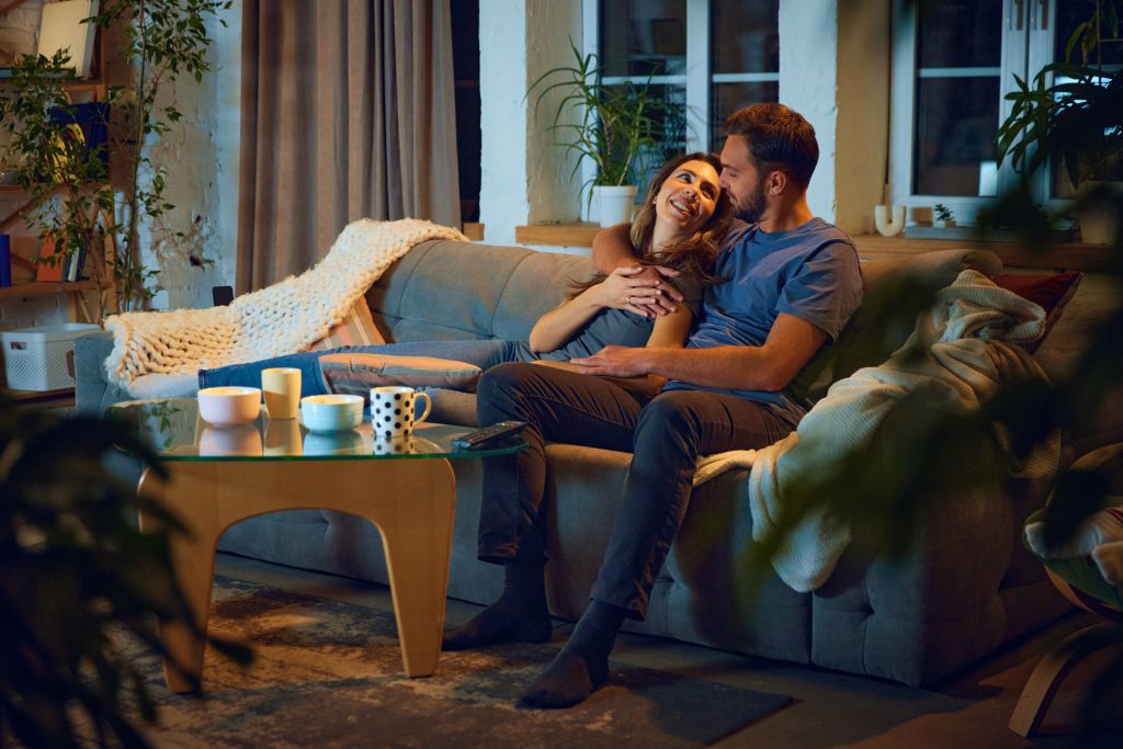  Couple cuddling on the couch