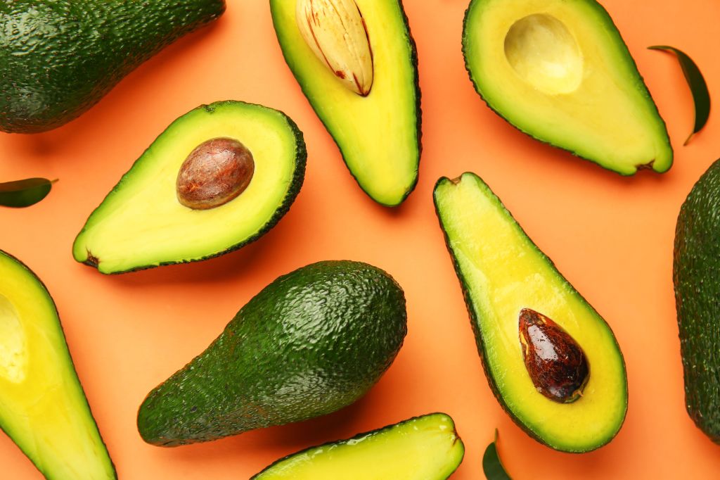 Fresh and ripe sliced avocados 