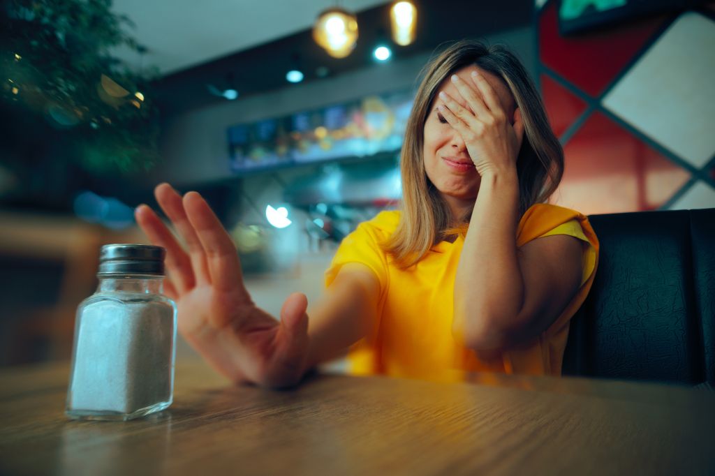 Woman refusing salt 