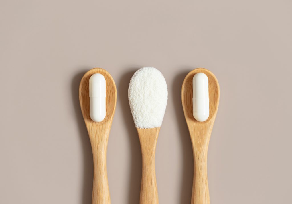 Powder and supplements on a spoon