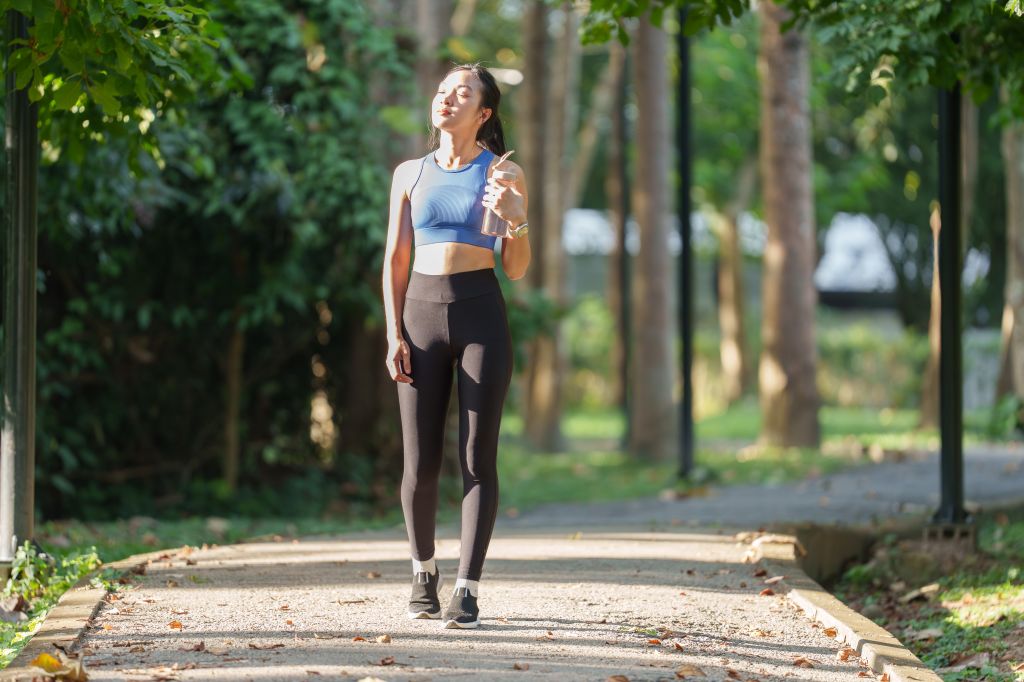 Woman walking in the sun
