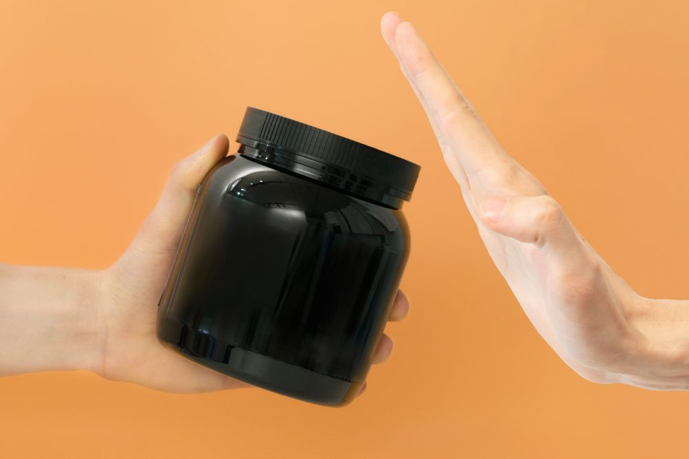Hand refusing a supplement 