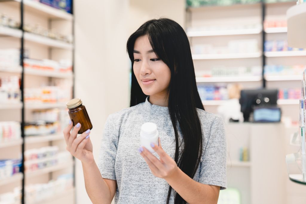 Woman comparing supplements 