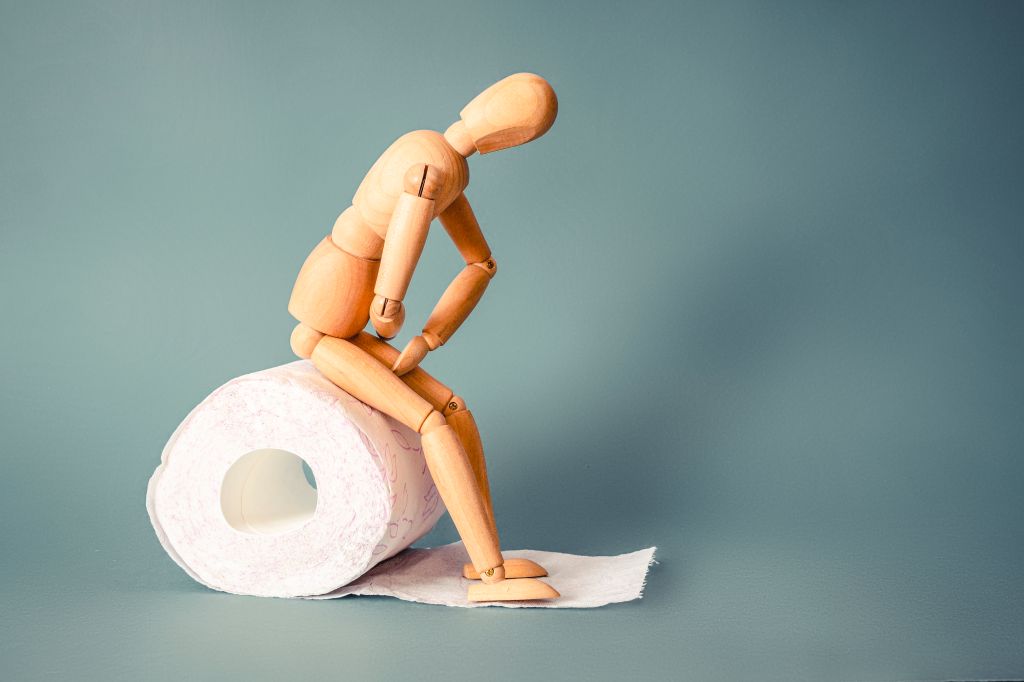 Constipation model on toilet paper