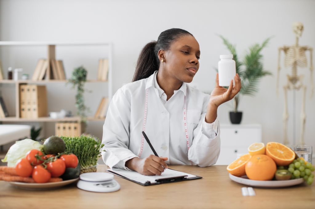 Woman looking at a supplement