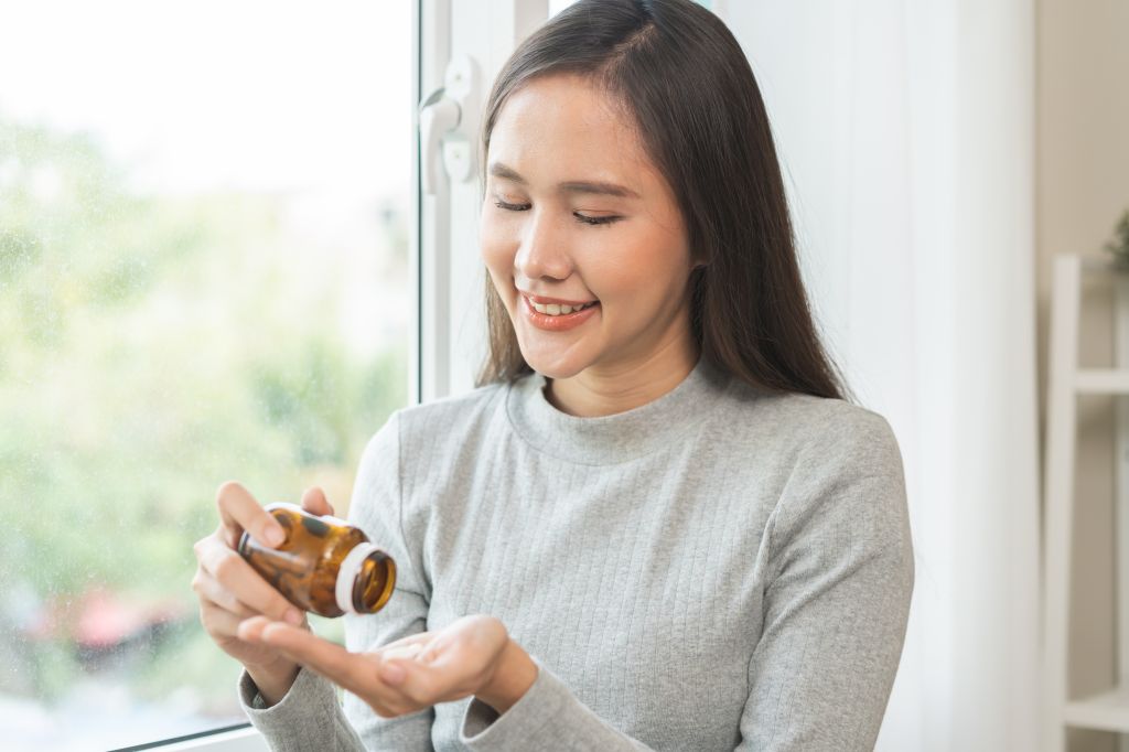 Woman taking supplements 