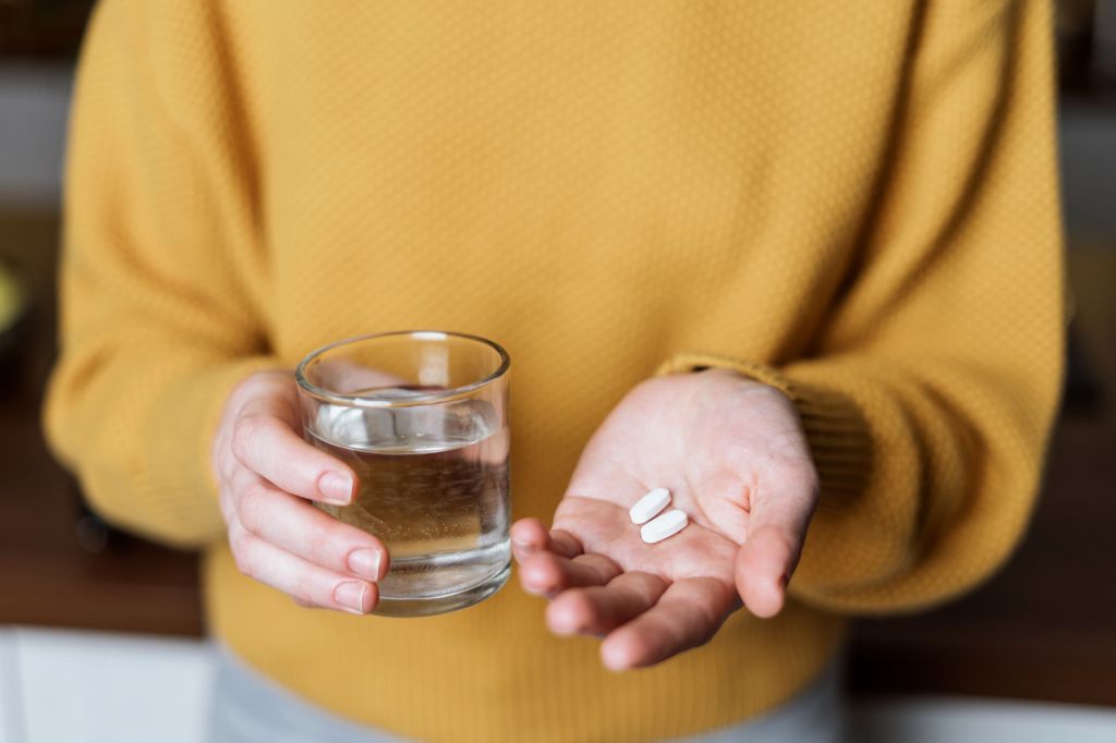 Hand holding supplements 