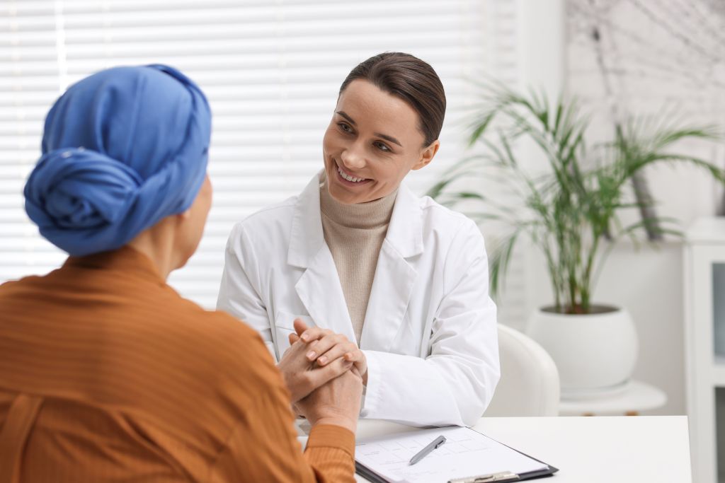 Woman with oncologist  