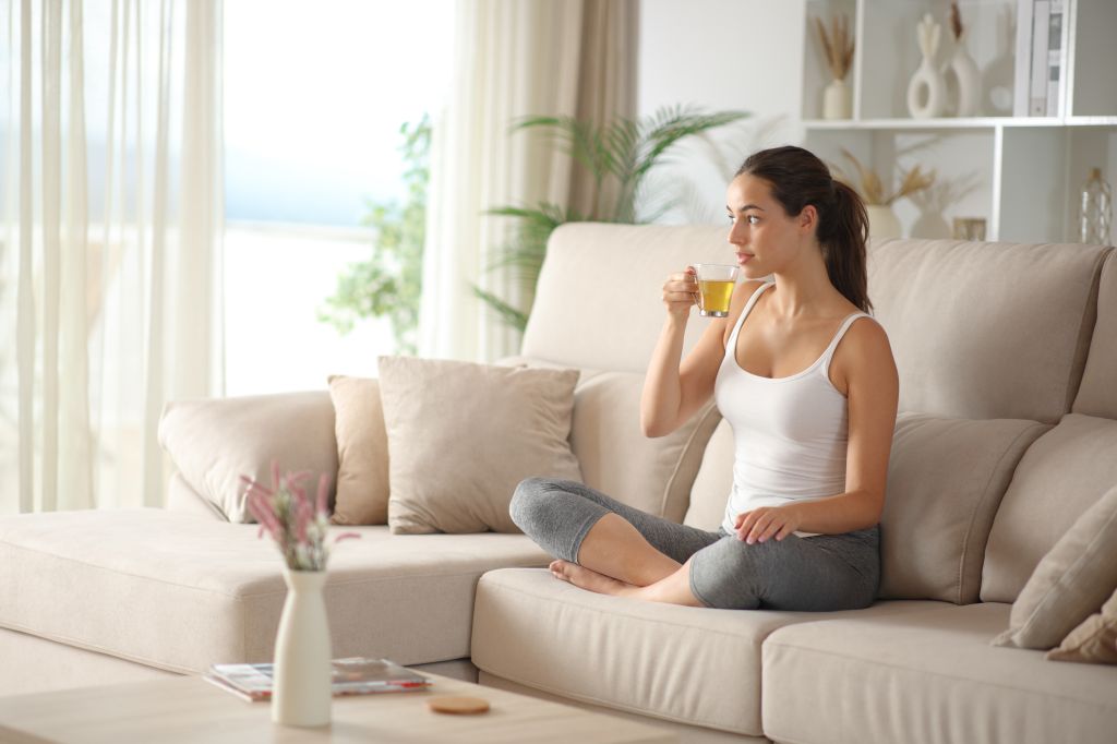Athletic woman resting on a couch