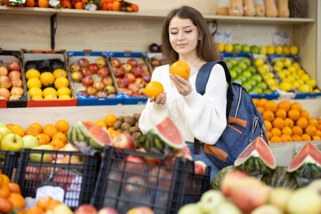 Woman buying fruits