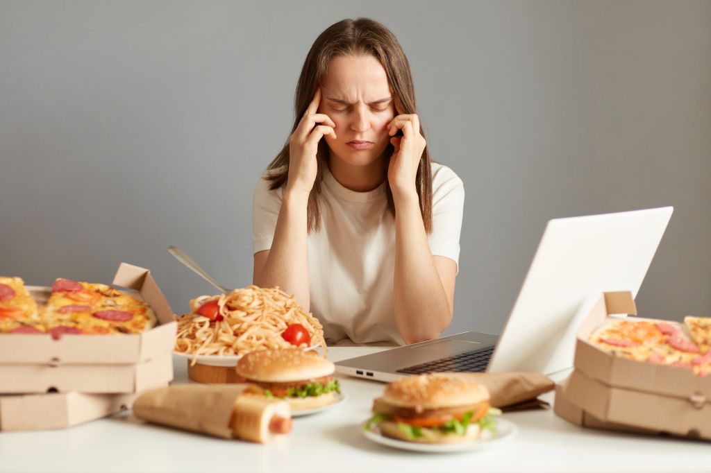 Woman struggling with overeating 