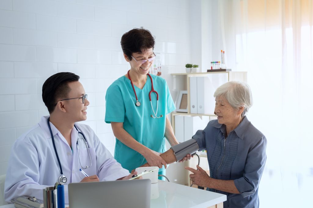 Older patient with doctor